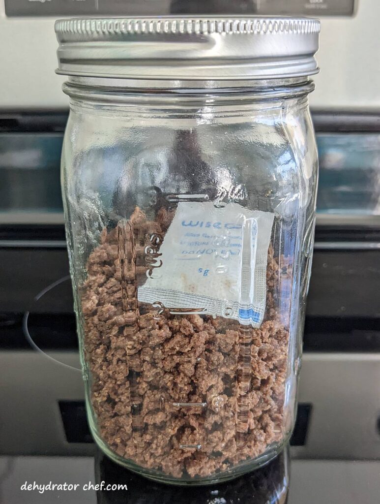 dehydrated ground beef in a mason jar with a 5-gram desiccant packet for short-term storage of several weeks
