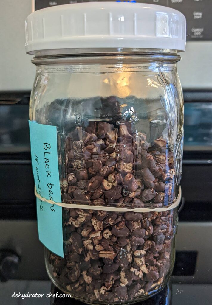 equalizing and conditioning dehydrated black beans in a canning jar is step 5 in how to dehydrate canned beans