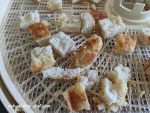 closeup of dehydrated biscuits on a dehydrator tray | dehydrating biscuits | dehydrating bread | dehydrated bread