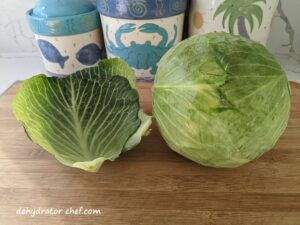 green cabbage on the cutting board