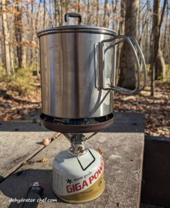 lunch is being cooked on a camp stove | dehydrated unstuffed cabbage rolls | making dehydrated meals for camping | homemade dehydrated meal recipes | make your own dehydrated camping food | homemade dehydrated camping meals | homemade dehydrated backpacking meals