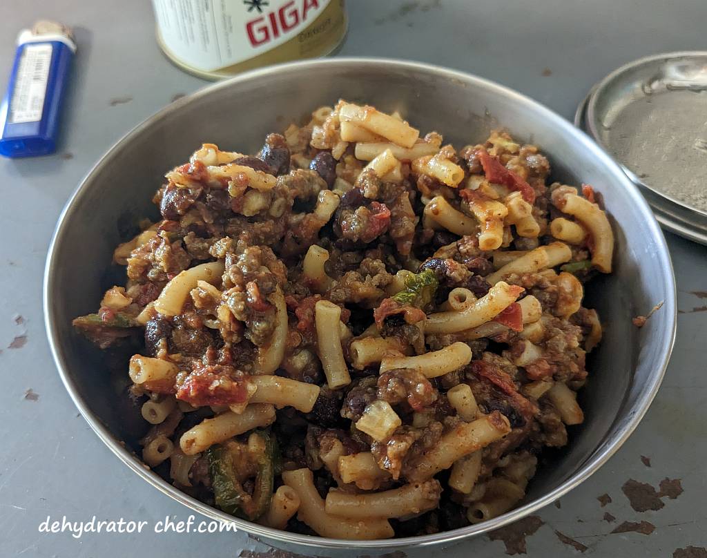 cooked chili mac in a camping bowl | best foods to dehydrate for long term storage | dehydrating food for long term storage | dehydrated food recipes for long term storage | dehydrating meals for long term storage | food dehydrator for long term storage