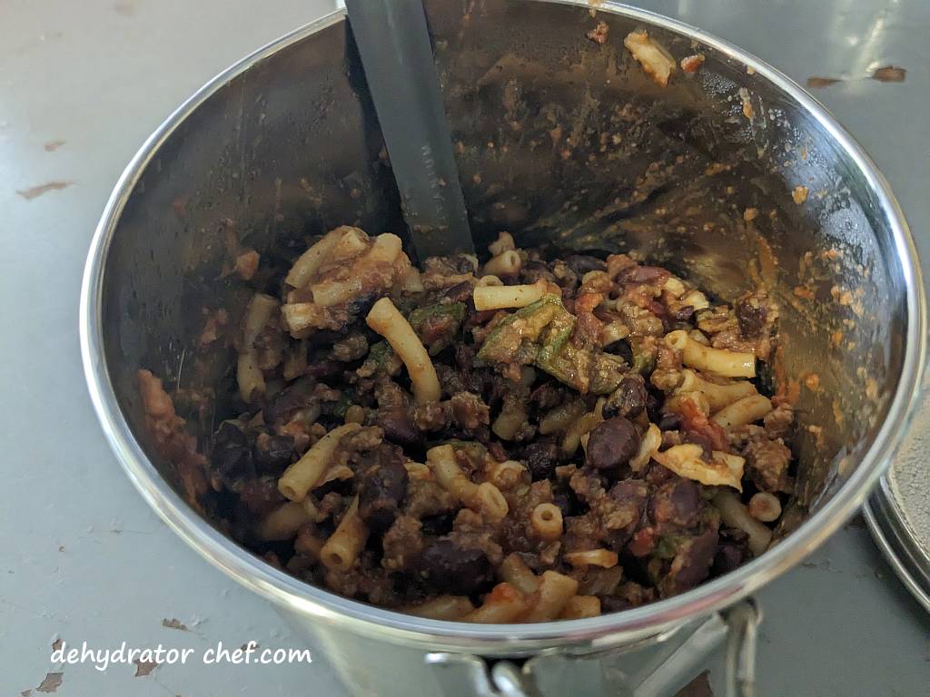 cooked dehydrated chili mac in cooking pot | best foods to dehydrate for long term storage | dehydrating food for long term storage | dehydrated food recipes for long term storage | dehydrating meals for long term storage | food dehydrator for long term storage