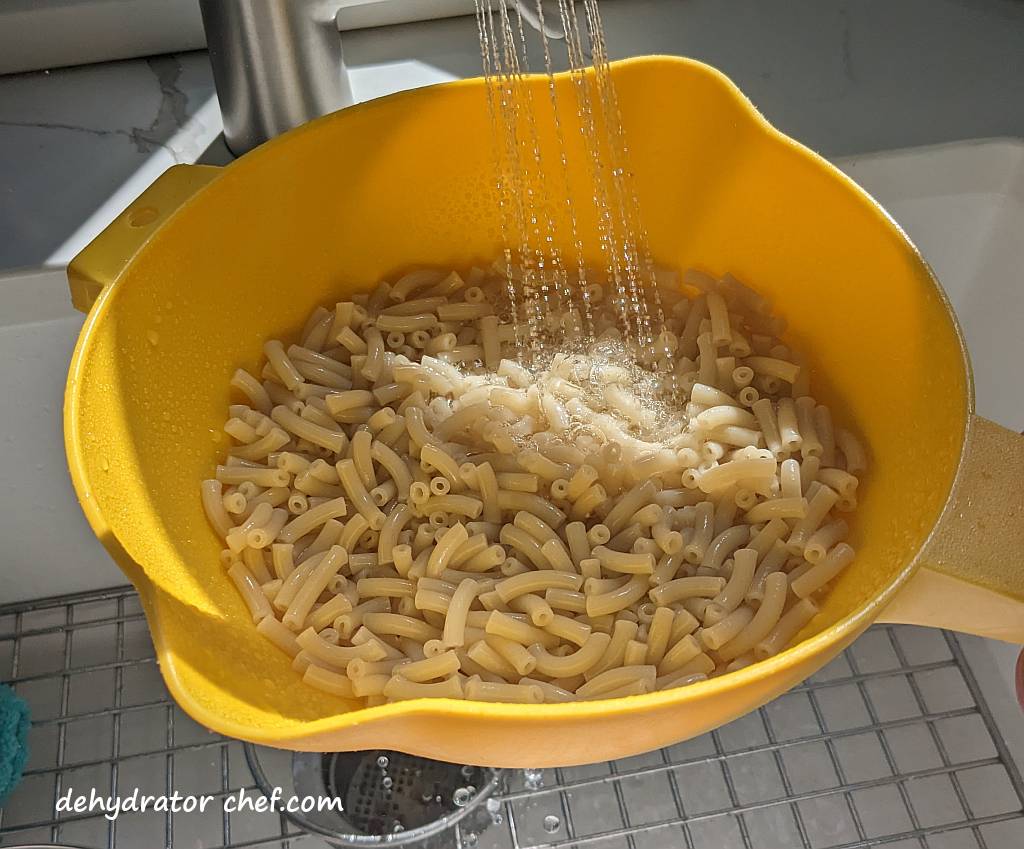 rinsing the cooked macaroni under cold water | | best foods to dehydrate for long term storage | dehydrating food for long term storage | dehydrated food recipes for long term storage | dehydrating meals for long term storage | food dehydrator for long term storage