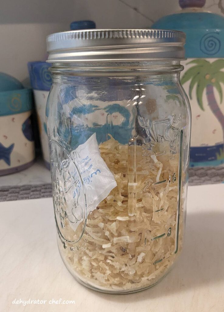 https://dehydratorchef.com/wp-content/uploads/2023/06/dehydrated-hash-browns-with-a-desiccant-packet-to-absorb-moisture-for-long-term-storing-in-a-canning-jar-737x1024.jpg