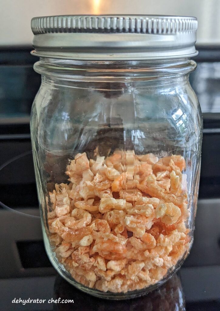 dehydrated shrimp conditioning in a canning jar | | dehydrating shrimp | how to dehydrate shrimp | best foods to dehydrate for long term storage | dehydrating food for long term storage | dehydrated food recipes for long term storage | dehydrating meals for long term storage | food dehydrator for long term storage | making dehydrated meals for camping | homemade dehydrated meal recipes | make your own dehydrated camping food | homemade dehydrated camping meals | homemade dehydrated backpacking meals