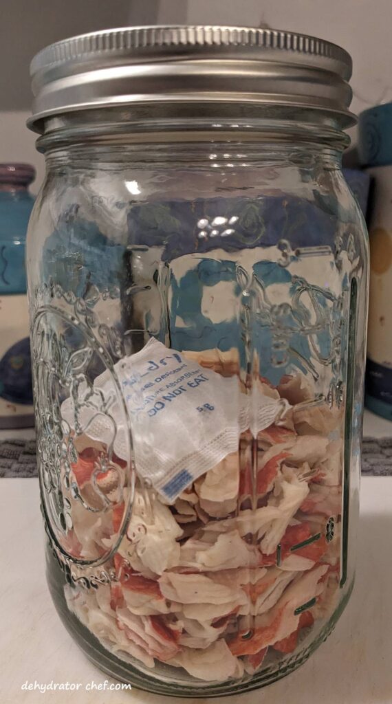 dried imitation crab meat in a canning jar with a desiccant packet for moisture control and long shelf life dried imitation crab meat in a canning jar with a desiccant packet for moisture control and long shelf life