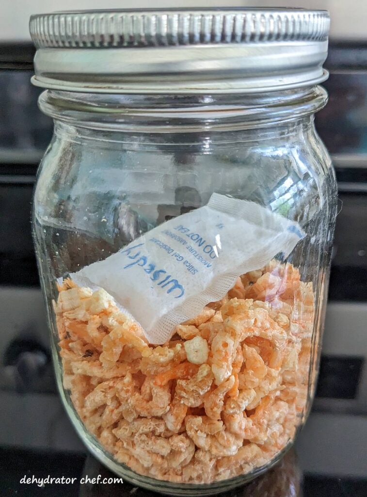 dried shrimp in canning jar with desiccant packet for moisture control and long shelf life | | dehydrating shrimp | how to dehydrate shrimp | best foods to dehydrate for long term storage | dehydrating food for long term storage | dehydrated food recipes for long term storage | dehydrating meals for long term storage | food dehydrator for long term storage | making dehydrated meals for camping | homemade dehydrated meal recipes | make your own dehydrated camping food | homemade dehydrated camping meals | homemade dehydrated backpacking meals