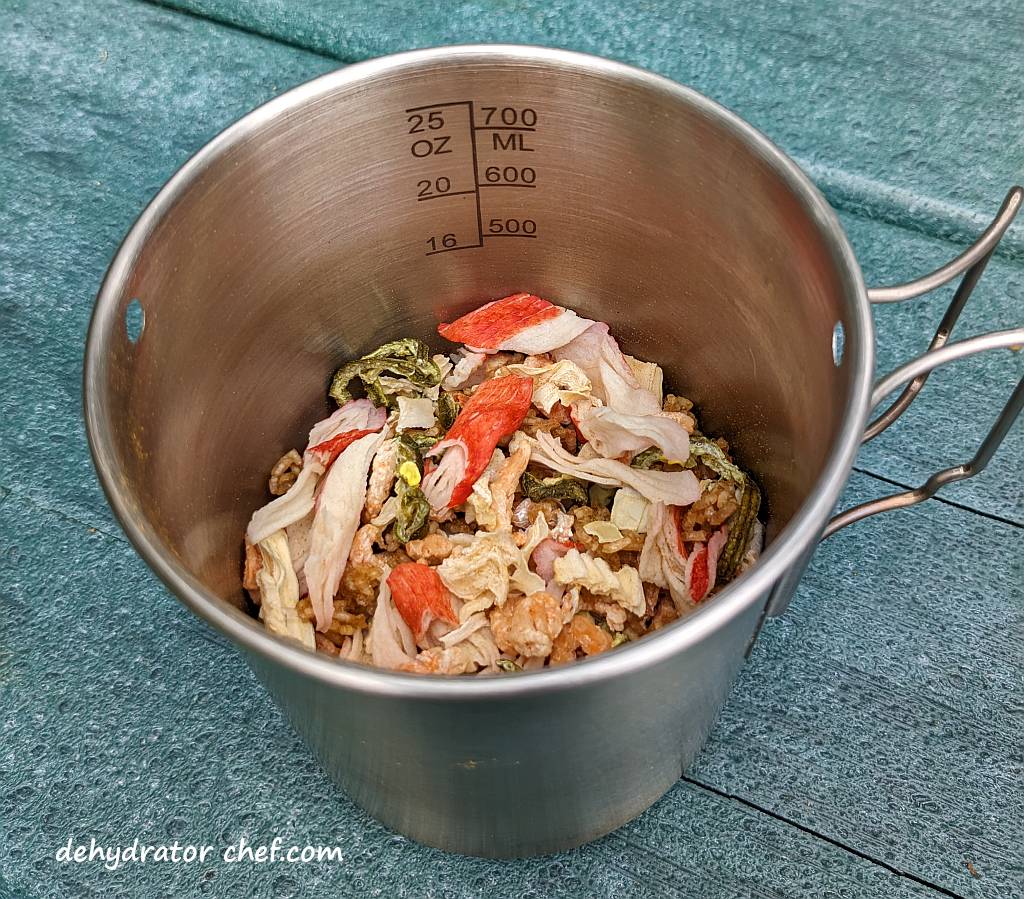 dehydrated seafood curry dry mix inside the cooking mug | dehydrated seafood curry | making dehydrated meals for camping | homemade dehydrated meal recipes | make your own dehydrated camping food | homemade dehydrated camping meals | homemade dehydrated backpacking meals