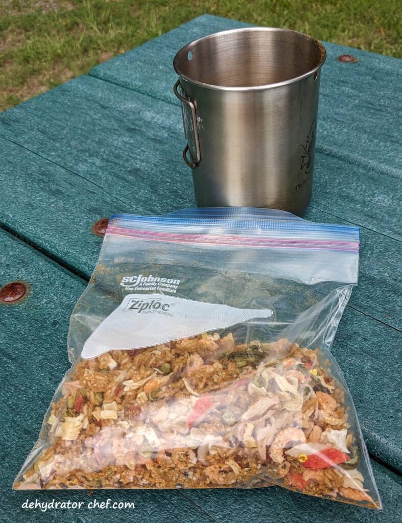 preparing the dehydrated seafood curry for rehydrating | dehydrated seafood curry | making dehydrated meals for camping | homemade dehydrated meal recipes | make your own dehydrated camping food | homemade dehydrated camping meals | homemade dehydrated backpacking meals