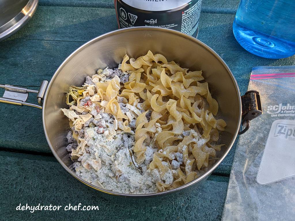 dehydrated beef stroganoff in a cooking pot | dehydrated beef stroganoff | making dehydrated meals for camping | homemade dehydrated meal recipes | make your own dehydrated camping food | homemade dehydrated camping meals | homemade dehydrated backpacking meals