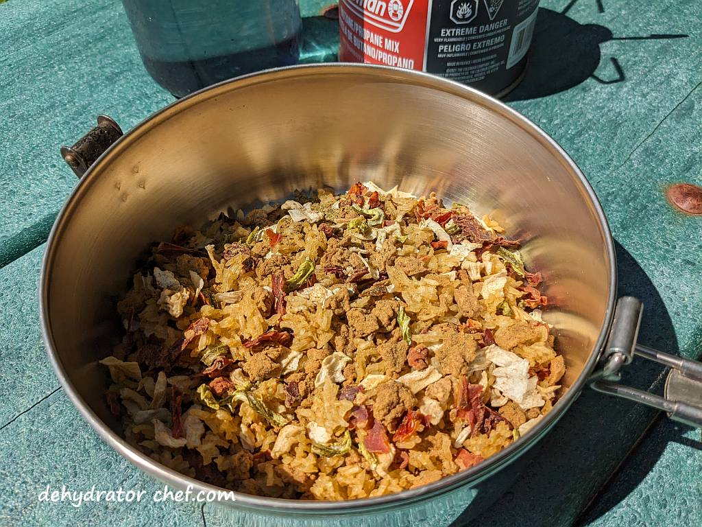 The dehydrated pork taco with Mexican rice dry mix has been added to our cooking pot.  In about 30 minutes, we’ll be chowing down on some outdoor good eats.