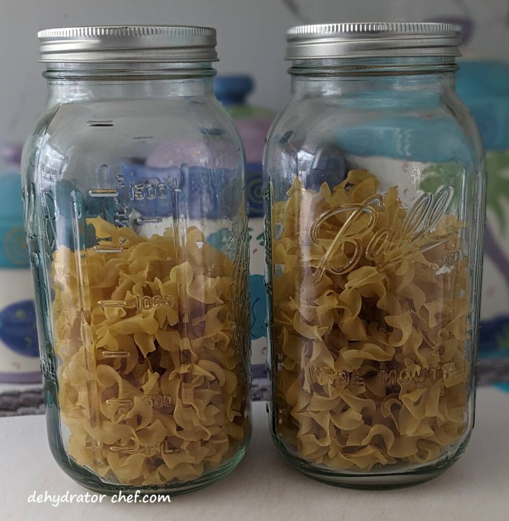 conditioning dehydrated noodles in clear canning jars | best foods to dehydrate for long term storage | dehydrating food for long term storage | dehydrated food recipes for long term storage | dehydrating meals for long term storage | food dehydrator for long term storage