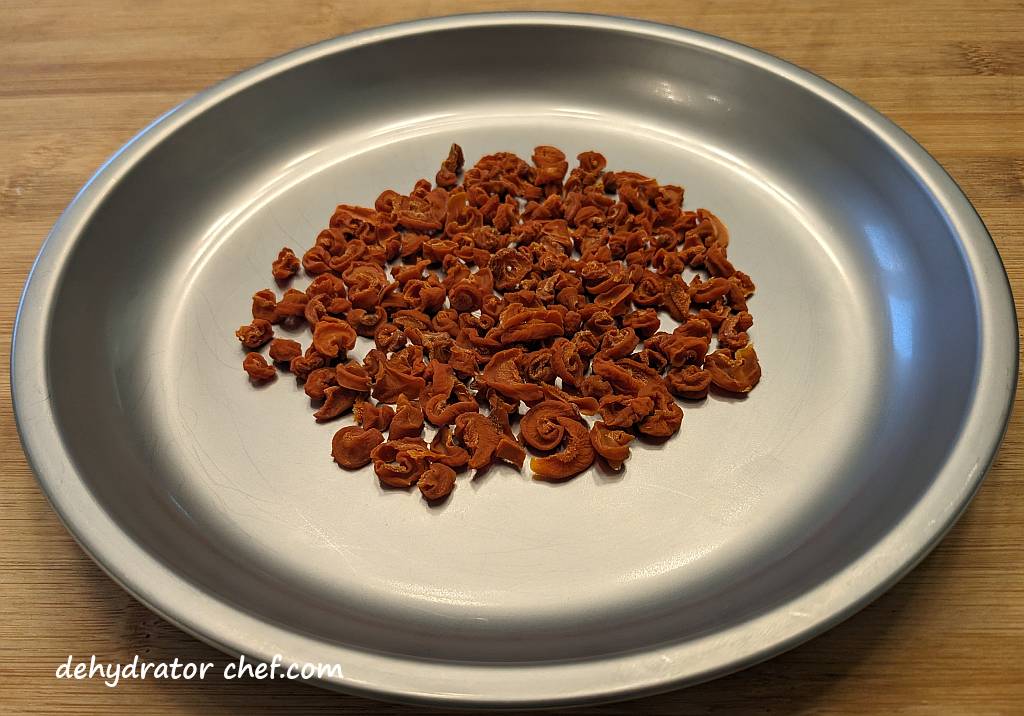 dehydrated carrots on a camping plate | dehydrating canned carrots | dehydrated carrots | best foods to dehydrate for long term storage | dehydrating food for long term storage | dehydrated food recipes for long term storage | dehydrating meals for long term storage | food dehydrator for long term storage