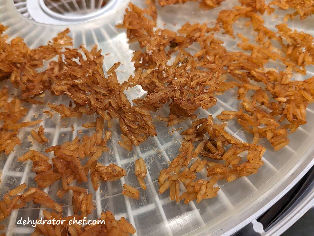 A close-up of the dehydrated Zatarain's Jambalaya Rice. The large rice clumps we started with were inspected several times as they dehydrated, and each time, we broke the larger pieces into smaller fragments to prevent case hardening.