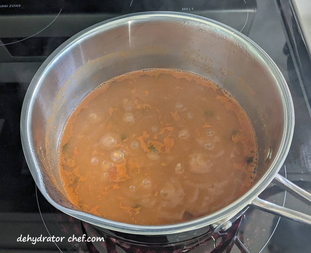 We are at Step 1, cooking the Zatarain’s Jambalaya Rice dry mix according to the package directions. However, we did not add the vegetable or olive oil as instructed.