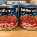 The two 11-ounce cans of chipotle peppers in adobo sauce that we will dehydrate today.