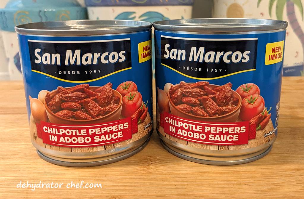 The two 11-ounce cans of chipotle peppers in adobo sauce that we will dehydrate today.