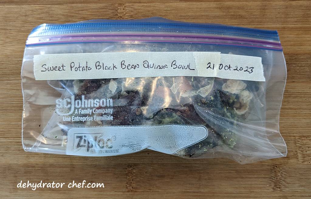 homemade dehydrated sweet potato black bean quinoa bowl ingredients in a 1-quart zip-top bag