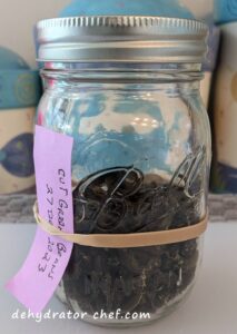 Forty-five grams of dehydrated green beans in a 1-pint canning jar.