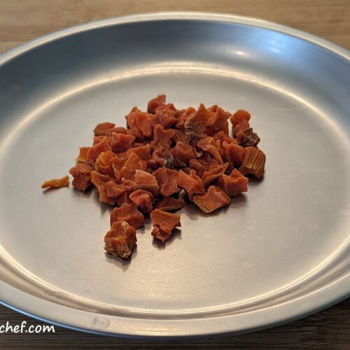 This is a 22-gram serving of dehydrated sweet potatoes, a tasty addition to our homemade dehydrated meals. Lightweight and nutrient-dense, sweet potatoes are one of the best foods to dehydrate for long-term storage. Properly dehydrated and stored, they can last for up to a year or more, making them an excellent choice for dehydrating food for long-term storage or stocking up. Be sure to add sweet potatoes to your list of foods that can be dehydrated.