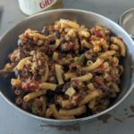 Need a quick and filling meal? This dehydrated chili mac recipe is the way to go. Ground beef, macaroni, and beans combine with dehydrated RoTel Diced Tomatoes with Green Chilies, onions, and seasonings for a classic comfort dish. A pinch of crushed red pepper flakes adds just the right amount of spice, and for those who like it a bit more zing, jalapeno peppers or chipotle peppers in adobo sauce make a great optional addition.