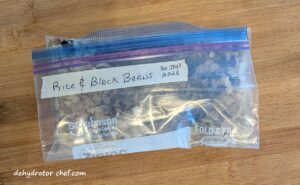 The dehydrated black beans and rice ingredients are safely put away in a zip-top bag for short-term storage until we make dinner this weekend at the campsite.