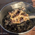 The black beans and rice have finished cooking and steaming to hydrate. We fluffed up the mix and added a bit of optional avocado oil to enhance the flavor a bit. We’re eating good tonight!